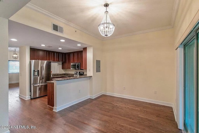 kitchen featuring kitchen peninsula, stainless steel appliances, dark wood-type flooring, and crown molding