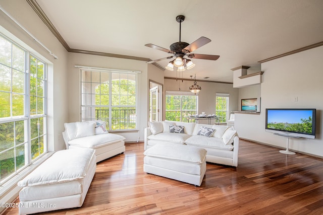 10961 Burnt Mill Rd Unit 421, Jacksonville, FL 32256 - living room featuring crown molding, wood finished floors, and a ceiling fan