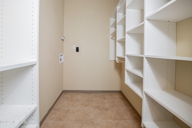 10961 Burnt Mill Rd Unit 421, Jacksonville, FL 32256 - walk in closet with light tile patterned floors