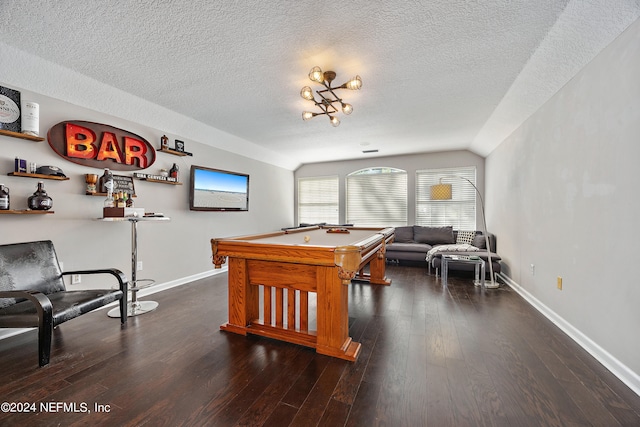 playroom with billiards, dark hardwood / wood-style floors, vaulted ceiling, and a textured ceiling