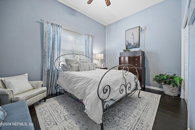 bedroom featuring dark hardwood / wood-style floors and ceiling fan