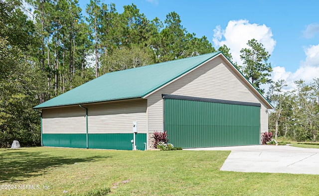 garage with a lawn