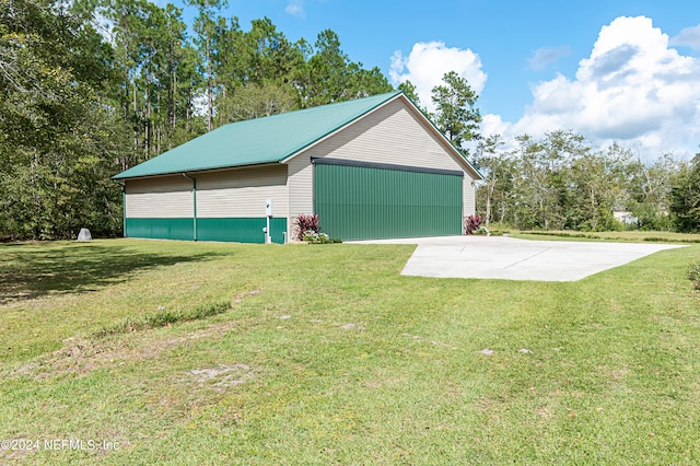 garage with a yard