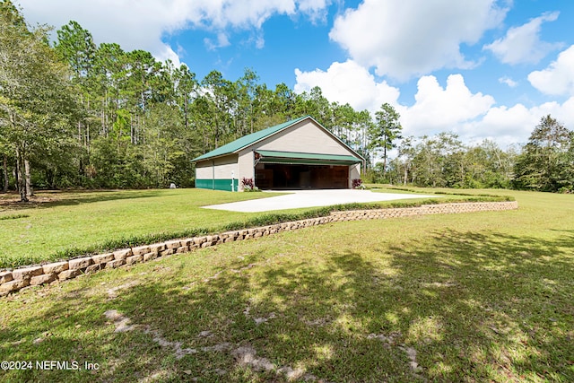 view of yard featuring a garage