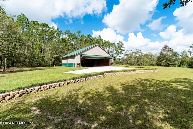 view of yard featuring a garage