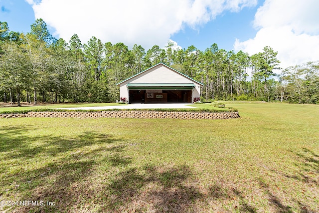 view of yard with a garage