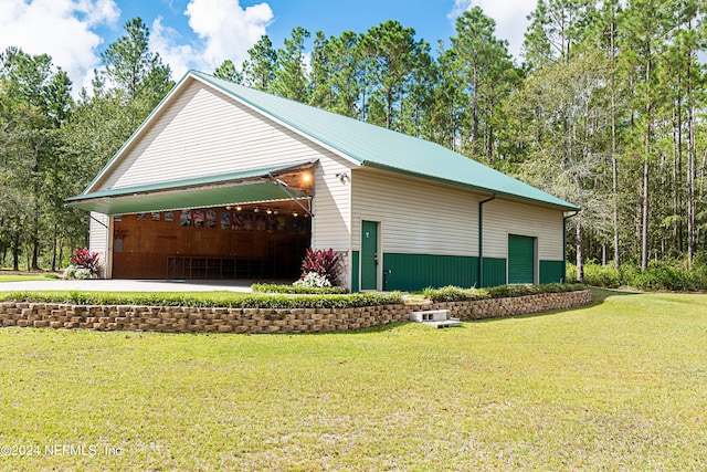 view of property exterior featuring a lawn