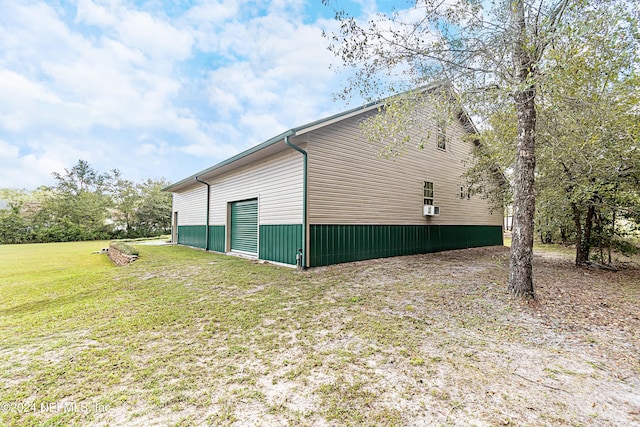 view of property exterior with cooling unit and a yard