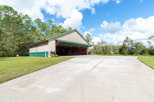 view of property exterior with a lawn