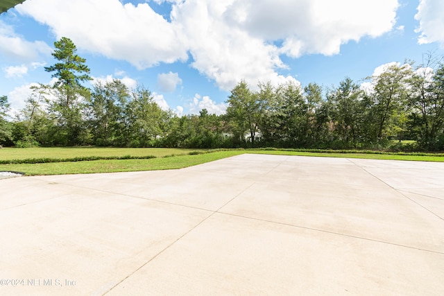 view of home's community featuring a lawn