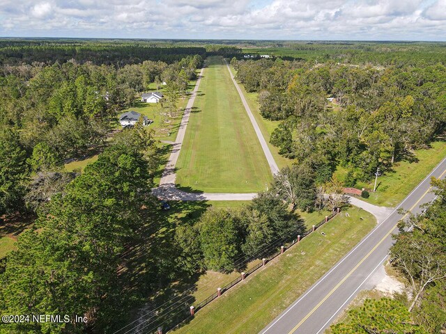 11111 Apache Ln, Glen St Mary, FL 32040 - aerial view of property and surrounding area with a forest