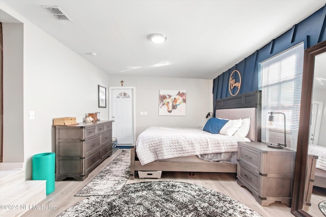 bedroom featuring light wood-type flooring