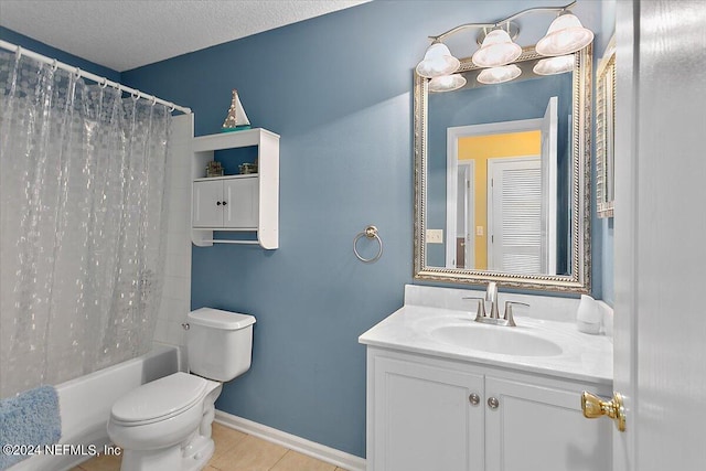 full bathroom featuring a textured ceiling, toilet, shower / bath combo with shower curtain, vanity, and tile patterned floors