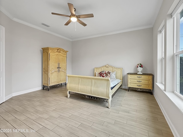 bedroom featuring ceiling fan, visible vents, baseboards, ornamental molding, and light wood-type flooring