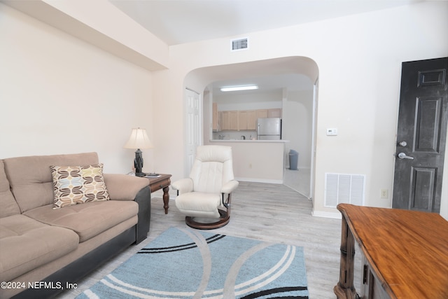 living room with light wood-type flooring