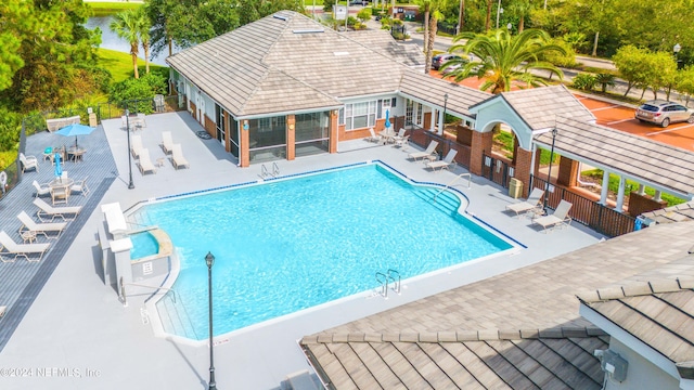 view of swimming pool with a patio area