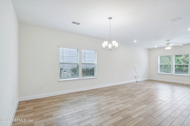 270 Clifton Bay Lp, Saint Johns, FL 32259 - spare room featuring baseboards, light wood finished floors, visible vents, and ceiling fan with notable chandelier