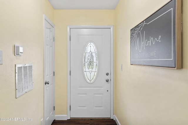 doorway to outside with dark hardwood / wood-style floors