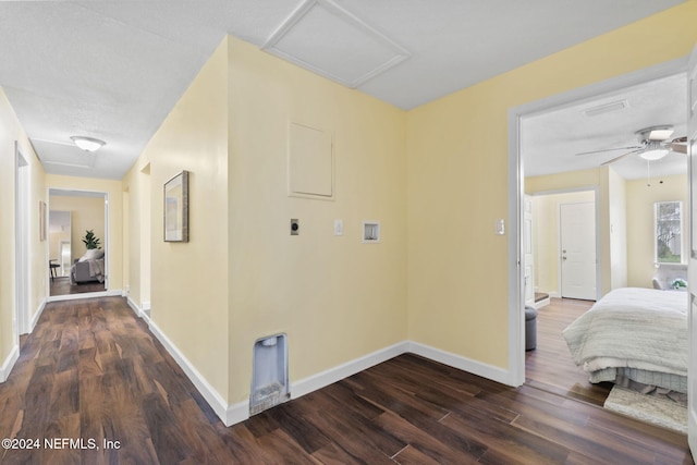 hallway featuring dark wood-type flooring