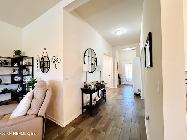 corridor with dark hardwood / wood-style floors