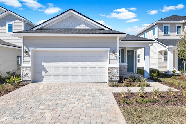 view of front of property featuring a garage