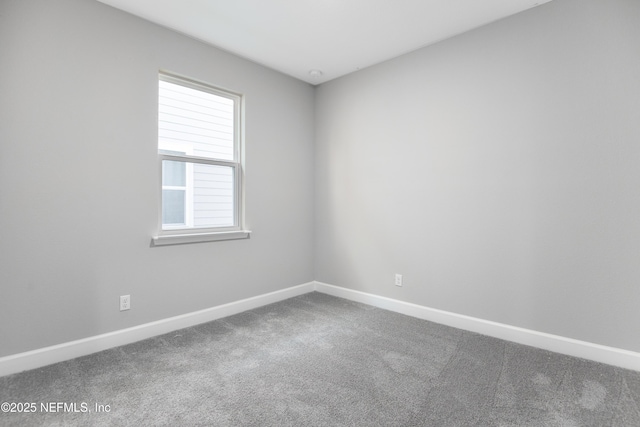 unfurnished room featuring carpet floors