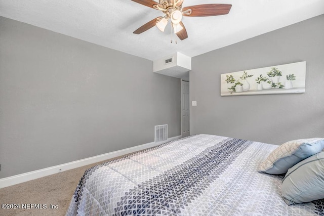 bedroom featuring ceiling fan and carpet floors