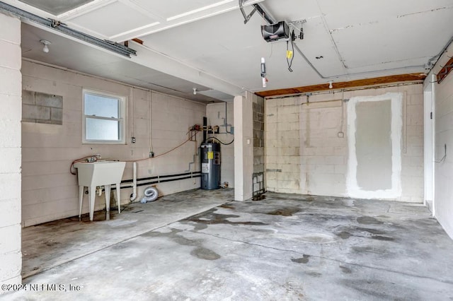 garage featuring a garage door opener and water heater