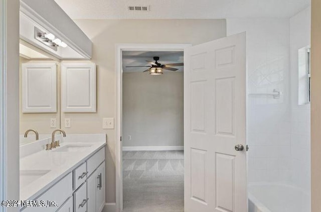 bathroom featuring vanity and ceiling fan