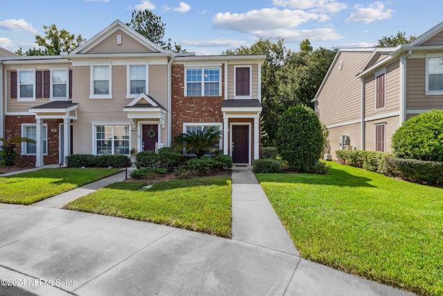 view of property with a front yard