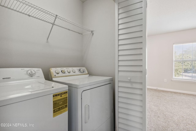 washroom with carpet and independent washer and dryer