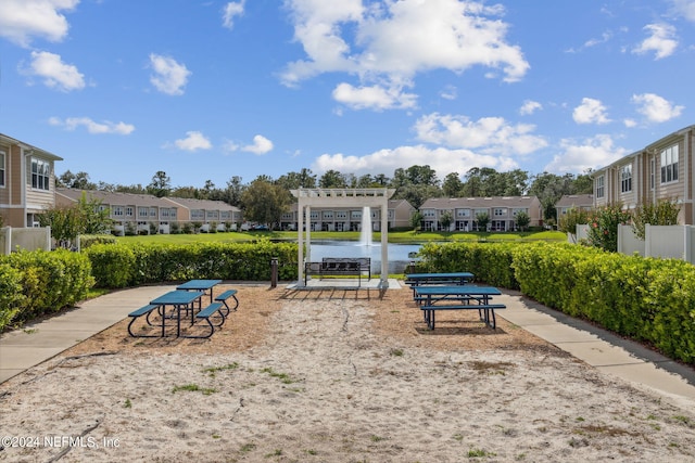 view of property's community featuring a water view