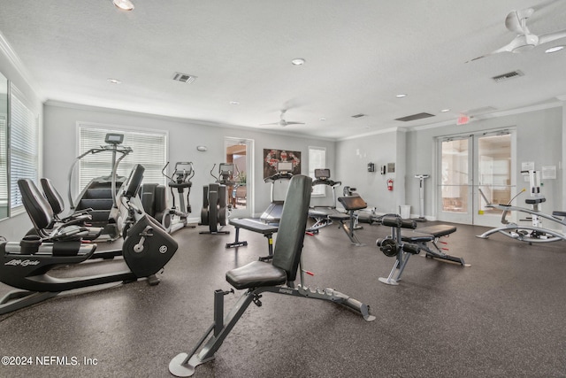 workout area featuring a textured ceiling, crown molding, ceiling fan, and french doors