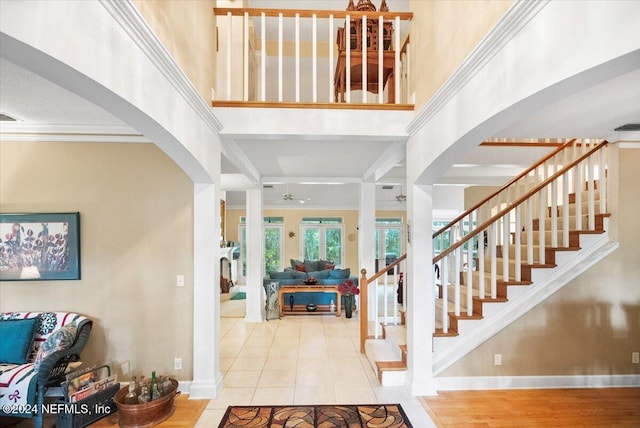 tiled entryway with ornamental molding