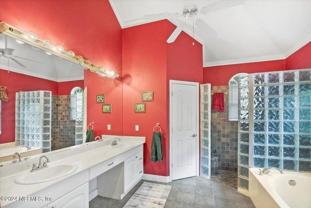 bathroom with ornamental molding, lofted ceiling, independent shower and bath, and vanity