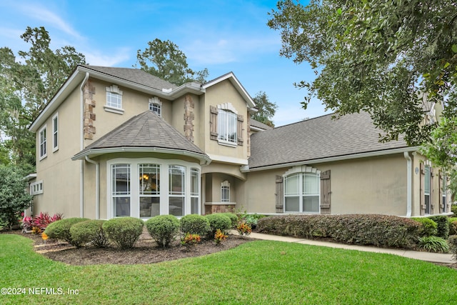 view of front of house with a front yard