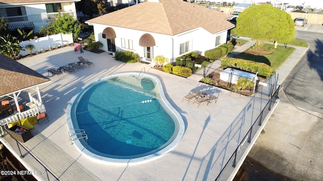 view of swimming pool featuring a patio