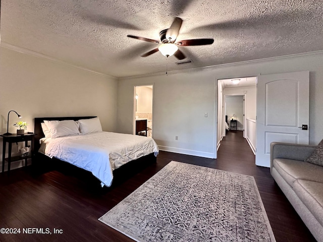 bedroom with connected bathroom, ceiling fan, dark hardwood / wood-style flooring, and a textured ceiling