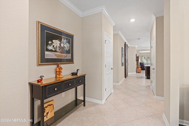 corridor featuring ornamental molding and light tile patterned floors