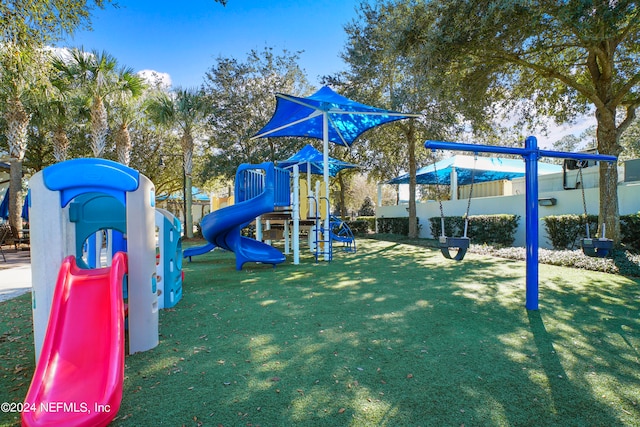 view of jungle gym featuring a yard