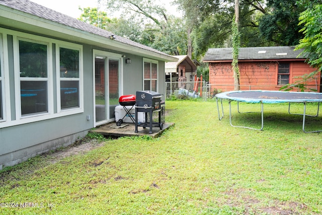 view of yard featuring a trampoline