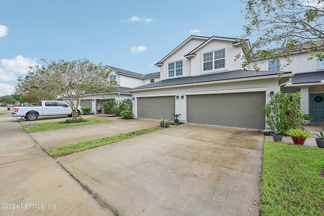 front facade with a garage