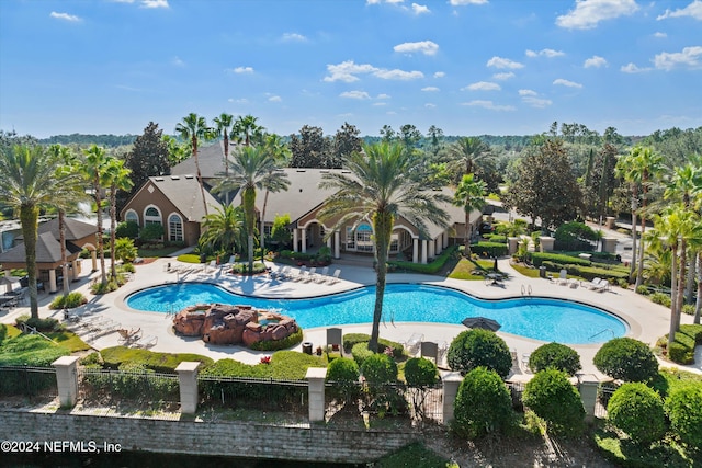 view of swimming pool with a patio area