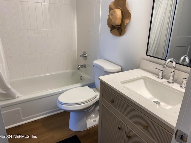 full bathroom featuring shower / bathtub combination with curtain, toilet, vanity, and hardwood / wood-style flooring