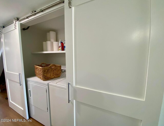 laundry room with independent washer and dryer