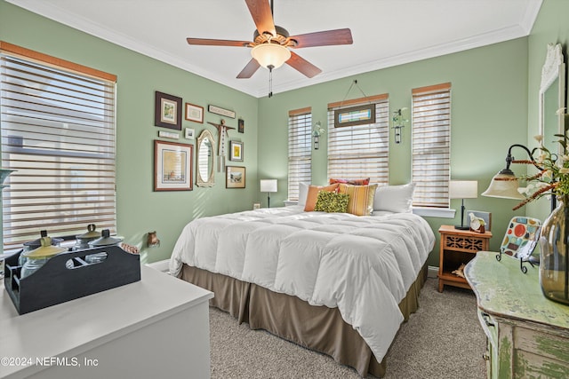 bedroom with light carpet, crown molding, and ceiling fan