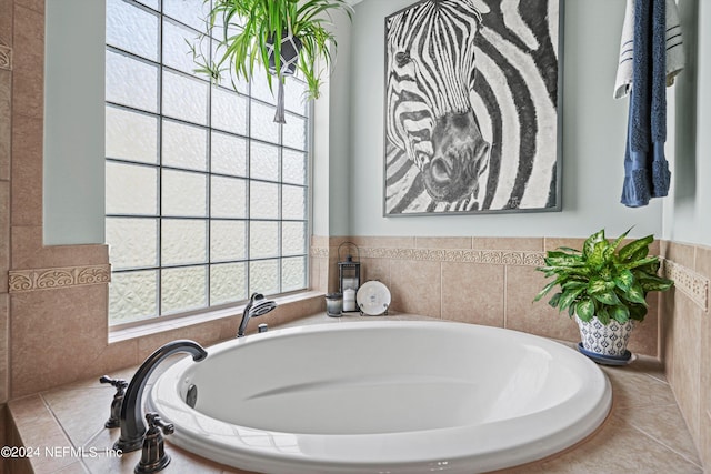 bathroom featuring a tub to relax in