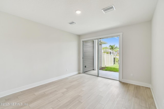 10266 Element Rd, Jacksonville, FL 32256 - unfurnished room with baseboards, light wood-style flooring, and recessed lighting
