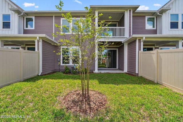 10266 Element Rd, Jacksonville, FL 32256 - back of house featuring a balcony and board and batten siding