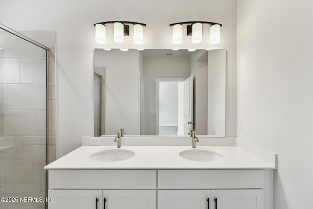 10266 Element Rd, Jacksonville, FL 32256 - full bathroom with double vanity and a shower stall
